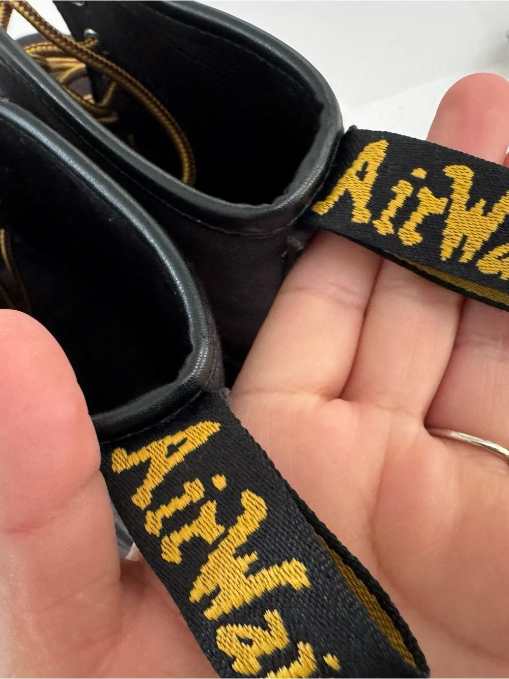 Dr. Martens Black Lace-Up Combat Boot with Yellow Heel Loop